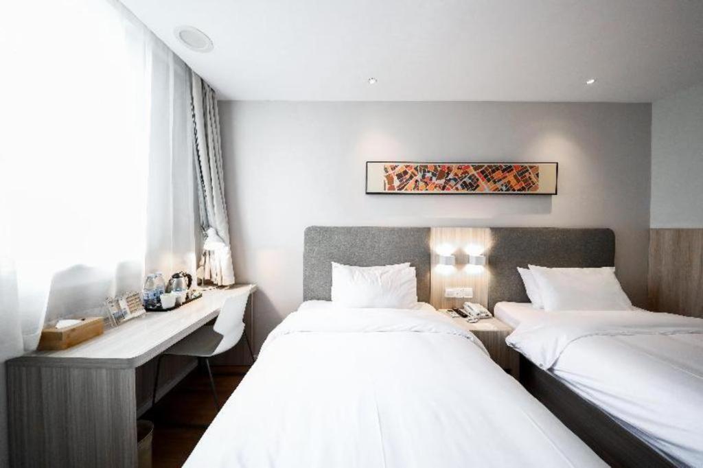 Hanting Hotel Shanghai Songjiang Esterno foto