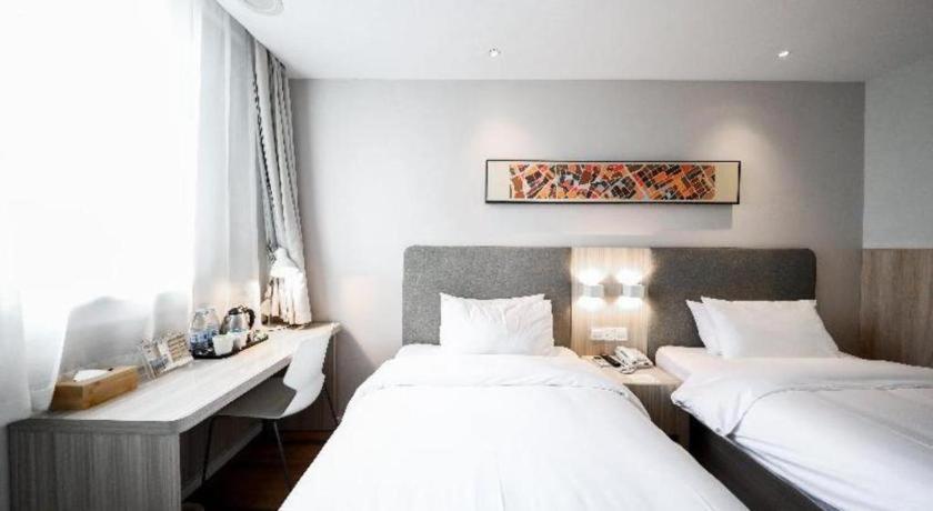 Hanting Hotel Shanghai Songjiang Esterno foto